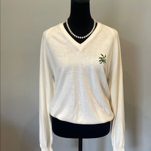 Elegant White V-Neck Sweater with Embroidered Detail